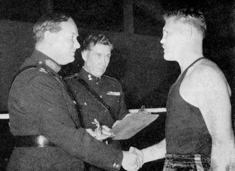 Corporal Chambers receiving the Land Forces Individual Medal
