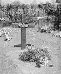 Original wooden cross that was erected over his grave.