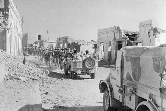 1/6th Queen's enter Tobruk to open the harbour.